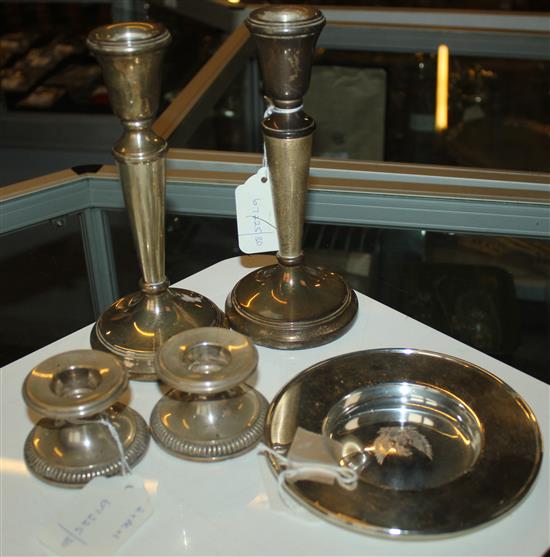 Pair of silver (800) gadrooned dwarf candlesticks, another pair of silver candlesticks and a crested circular dish